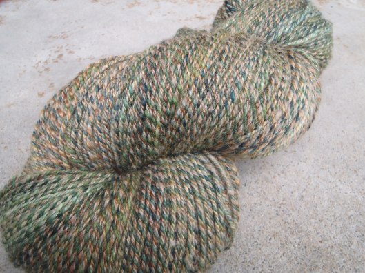 Camouflage - a 3-ply yarn of superwash merino, BFL and a merino-possum blend. 